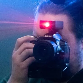 Фотографирователь фотоаппаратом
