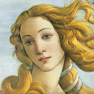 a young lady stands in her bedroom
